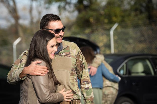 couple embracing after deployment