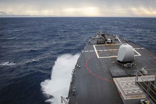 The USS John S. McCain transits through the South China Sea.
