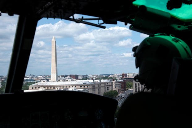 UH-1N Huey helicopter flies over Washington, D.C.