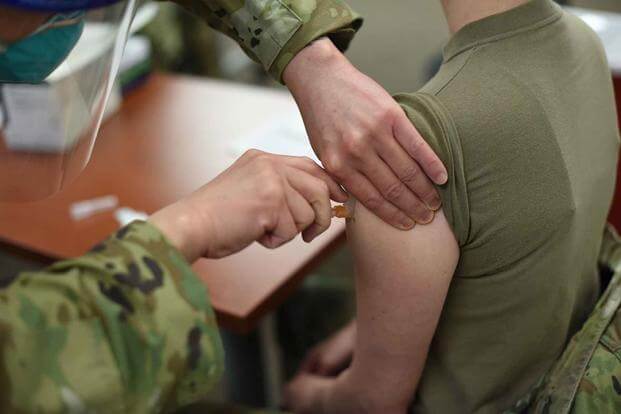 Airmen receive the first round of COVID-19 vaccines