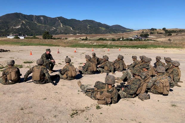 combat instructor chats with Marine infantrymen rifle range at Camp Pendleton