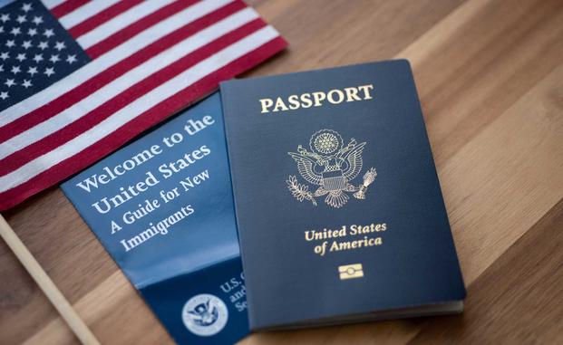 Passport and flag representing U.S. citizenship