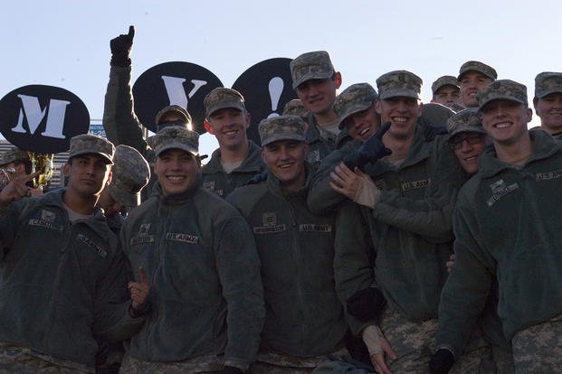 West Point cadets cheer during game against Air Force