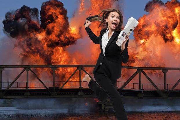 businesswoman runs away from bomb and explosion