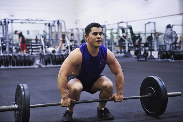 Senior airman prepares for the clean-and-jerk.