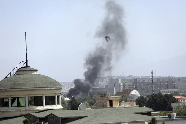 Smoke rises next to the U.S. Embassy in Kabul, Afghanistan.