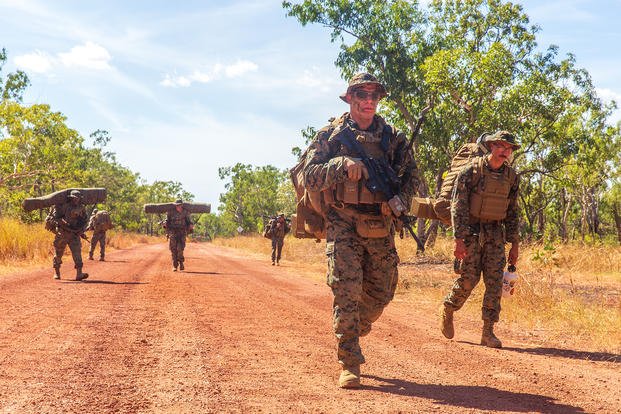 Marines hike in Australia.