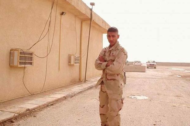 John Thampi in Tallil, Iraq, in 2005, where he served as a second lieutenant. 