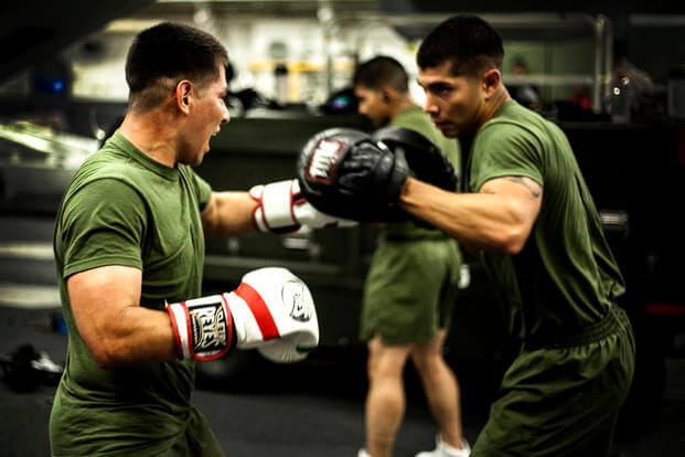 Marines work on boxing techniques.