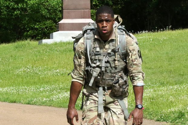 National Guardsman paces up a hill during a 12-mile ruck.
