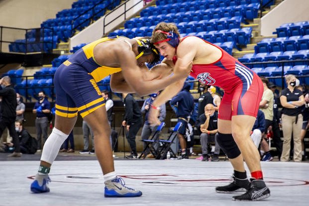 Wrestlers compete in a Marine Corps-sponsored tournament.