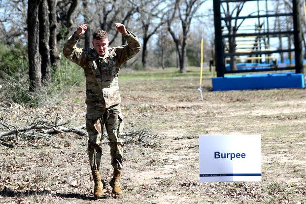 A National Guardsman performs burpees during the Best Warrior competition.