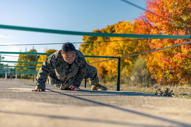 Marine Corps Cpl. Inori Hayashi completes an obstacle course during a bilateral exchange with French counterparts at Canjuers military camp in France, Nov. 2, 2021.