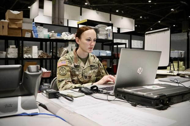 All Soldiers Will Have Email After System Change Army Leaders Promise   Mil Army Soldier Checks Email 1800 