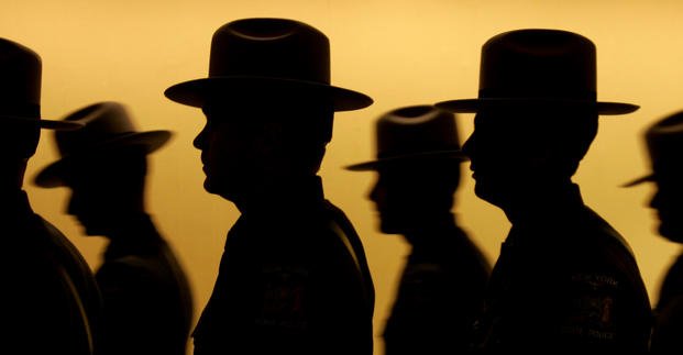 Silhouette of some of the 92 graduating state police officers