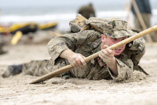 SEAL candidates test their grit while paying homage to the service members who took part in the D-Day landings.