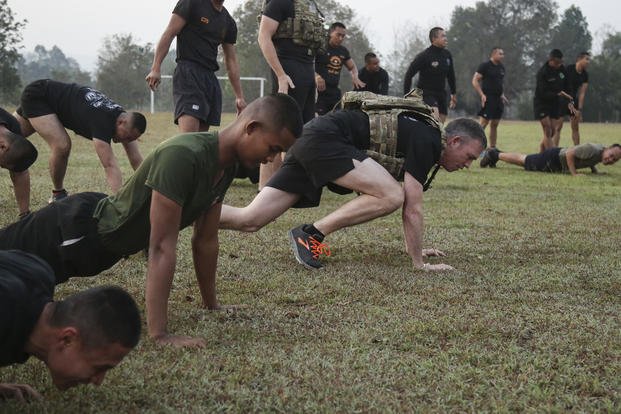 Special Forces soldiers conduct a Fallen Warrior workout.