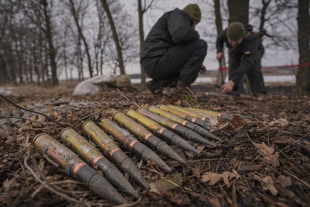 Ukrainian servicemen set up large caliber ammunition during an exercise in a Joint Forces Operation