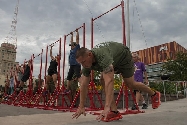 A Marine drops down to do a burpee during physical training.
