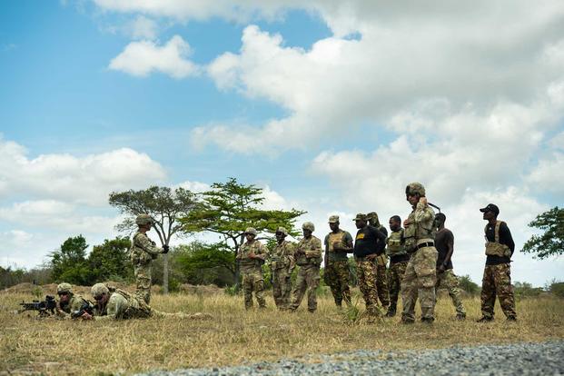 U.S. soldiers and Kenyan Defence Forces Rangers at Camp Simba in Manda Bay, Kenya.