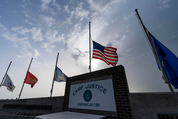 flags fly at half-staff at Camp Justice in Guantanamo Bay Naval Base, Cuba