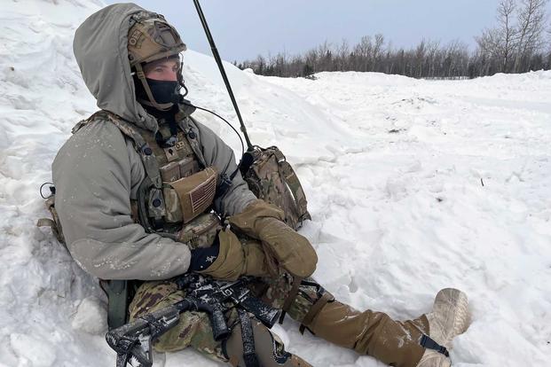 A tired soldier bundled up in subzero conditions in Alaska.