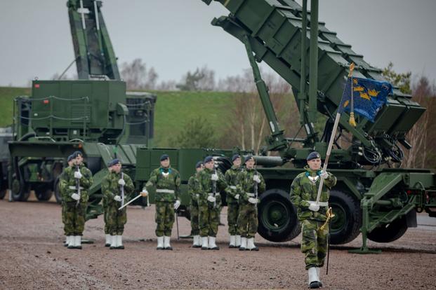 Swedish air defense regiment members participated in a hand-over ceremony in Halmstad, Sweden.