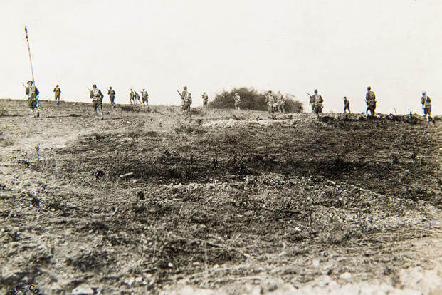 Troops advance in France during World War I.