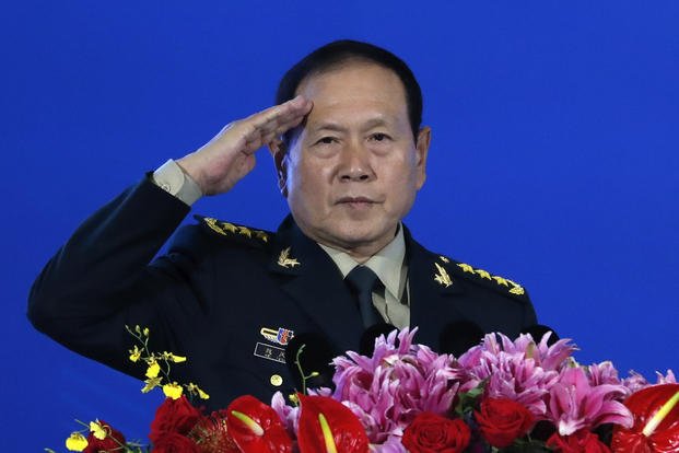 Chinese Defense Minister Wei Fenghe salutes 