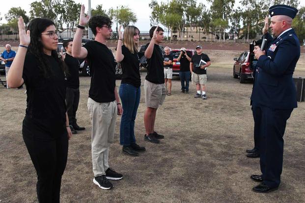 U.S. Space Force recruits recite the Oath of Enlistment.