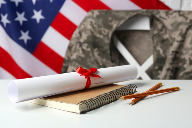 a diploma with an American flag and camouflage jacket