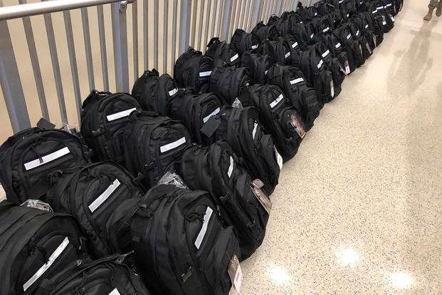 Backpacks for boot camp are lined up at Joint Base San Antonio-Lackland. 