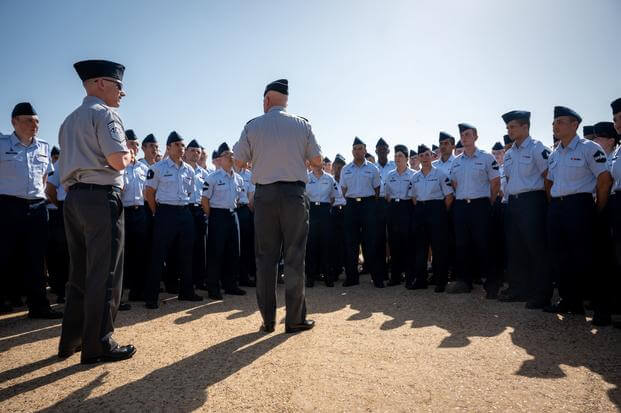 Gen. John Raymond stands before new graduates of Space Force boot camp.