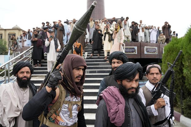 Taliban fighters celebrate one year since they seized the Afghan capital, Kabul