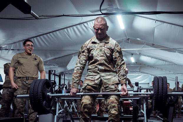 Sgt. Maj. of the Army Michael A. Grinston deadlifts during his visit at Camp Herkus, Lithuania.