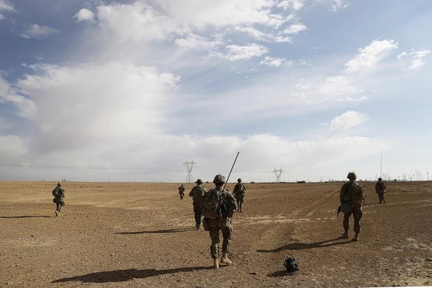 U.S. Army soldiers on a reconnaissance patrol in a rural villag in western Iraq. 