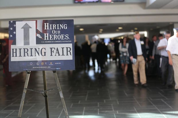 Marines and their spouses from Marine Corps Air Station Cherry Point, N.C., attend a Hiring our Heroes hiring fair at the American Legion National Convention. 