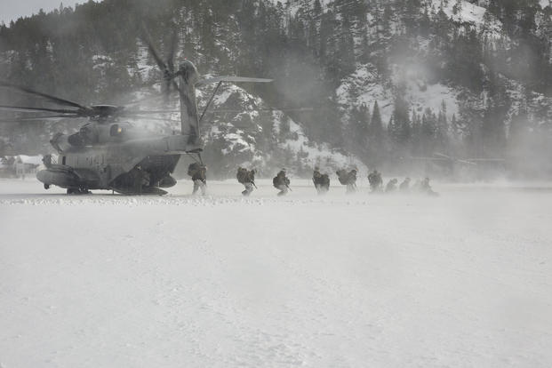Soldiers exit aircraft during Exercise Cold Response 16.