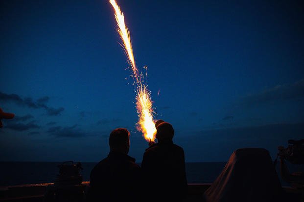 U.S. Navy sailors assigned to the Arleigh Burke-class guided-missile destroyer USS Paul Ignatius (DDG 117) fire pencil flares during training.