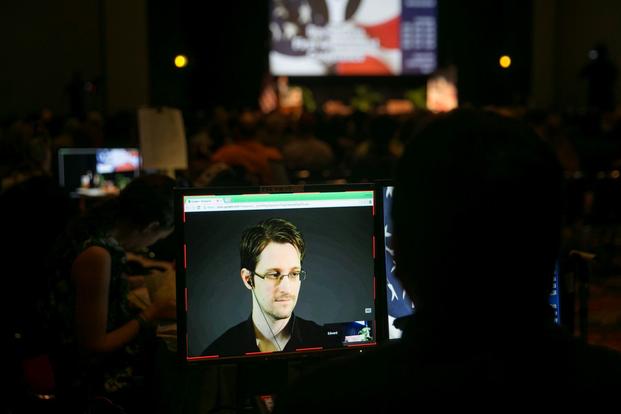 National Security Agency leaker Edward Snowden talks during a teleconference. 
