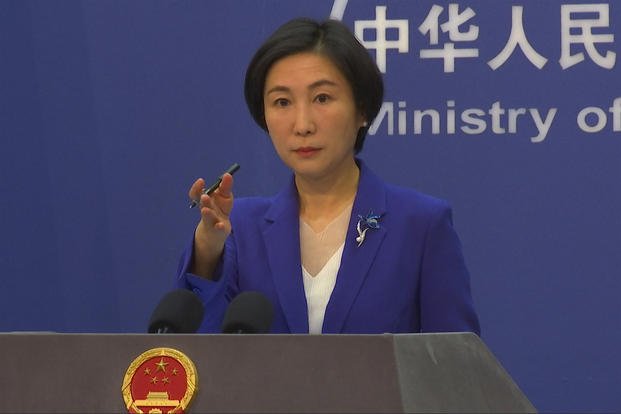 Chinese Foreign Ministry spokesperson Mao Ning gestures during a press conference