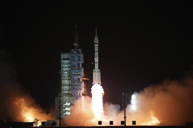manned spaceship Shenzhou-15, atop the Long March-2F Y15 carrier rocket, blasts off