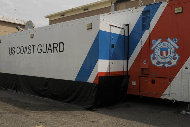 A U.S. Coast Guard Sector San Juan mobile command center is stationed next to the command center building in San Juan, Puerto Rico.