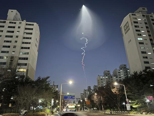 A light trail is seen in Goyang, South Korea.