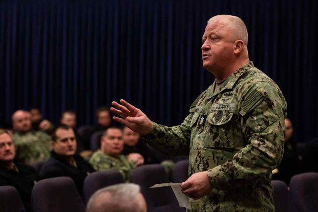 Master Chief Petty Officer of the Navy James Honea speaks with sailors.