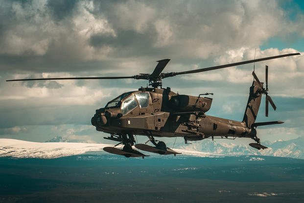 A U.S. Army AH-64D Apache Longbow attack helicopter flies over Fort Wainwright, Alaska.