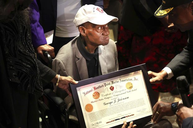 Cpl. George J. Johnson, 101, was recognized as a recipient of the Congressional Gold Medal during a ceremony at the African-American Research Library and Cultural Center in Fort Lauderdale.