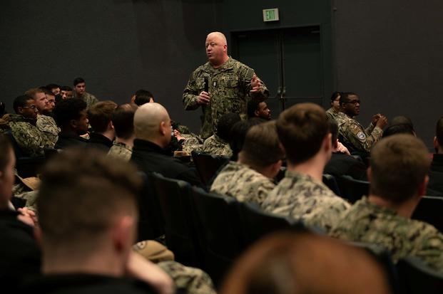 Master Chief Petty Officer of the Navy James Honea speaks with sailors.