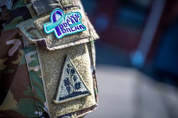 A Connecticut National Guard soldier wears a "breaking the stigma" patch.