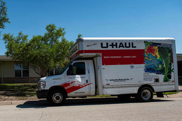 A moving truck sits at the ready to move a family from Laughlin Air Force Base, Texas, to their new home and base.
